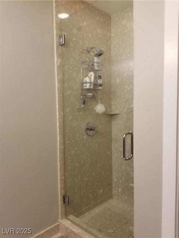 bathroom featuring walk in shower