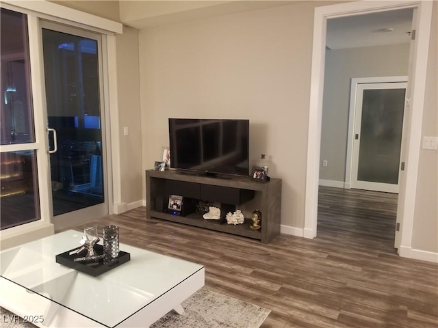 living room featuring dark wood-type flooring