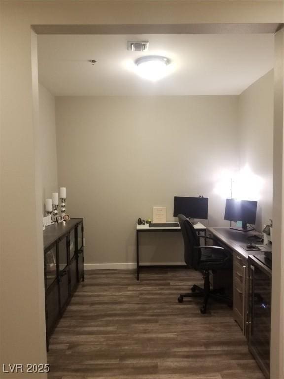 office featuring wine cooler and dark hardwood / wood-style flooring