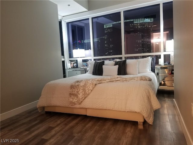 bedroom featuring dark hardwood / wood-style floors