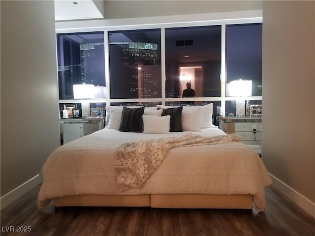 bedroom featuring hardwood / wood-style floors