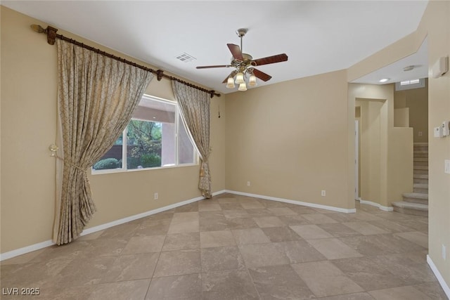 unfurnished room featuring ceiling fan