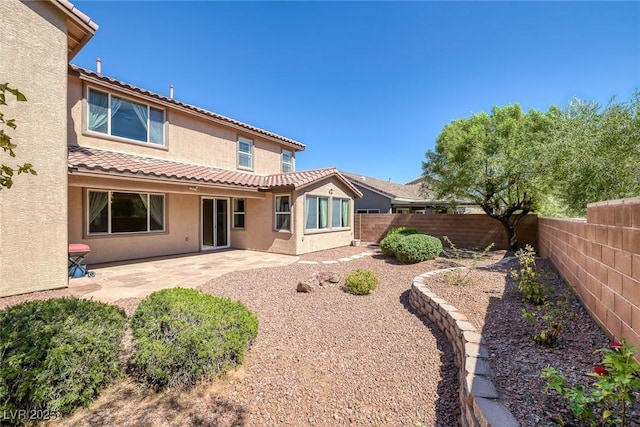 rear view of property with a patio area