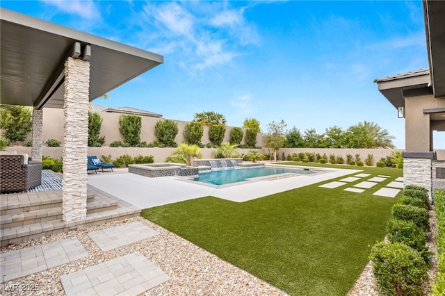 view of pool with a lawn, an in ground hot tub, and a patio