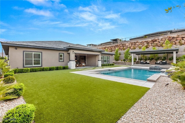 rear view of property with a yard, a patio, and an outdoor hangout area