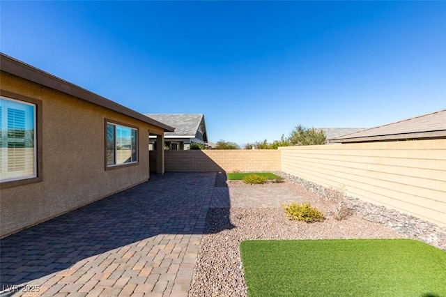 view of yard with a patio