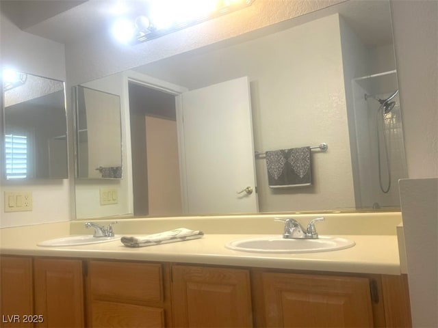 bathroom featuring vanity and walk in shower