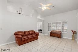 living room featuring light tile patterned floors and ceiling fan