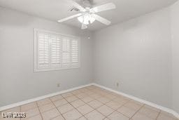 spare room featuring ceiling fan