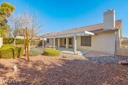 rear view of property with a patio