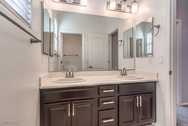 bathroom featuring vanity and plenty of natural light