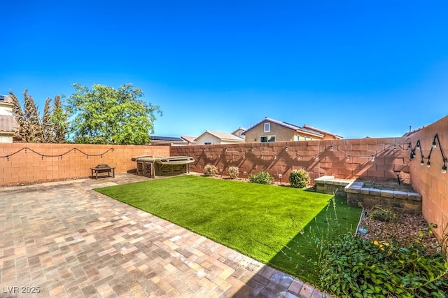 view of yard featuring a patio area