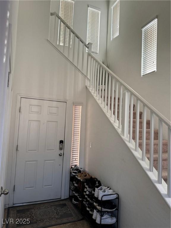 entrance foyer featuring a high ceiling