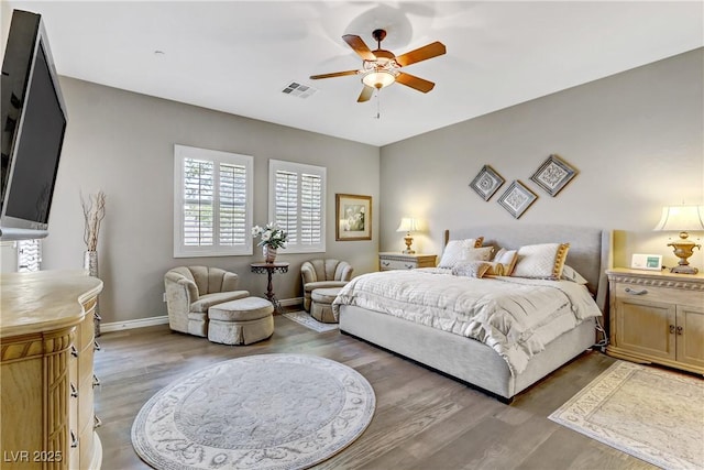 bedroom featuring ceiling fan and wood-type flooring