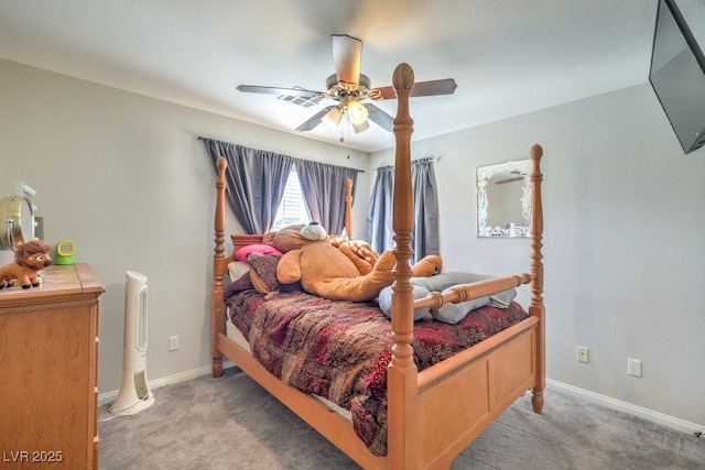 bedroom featuring ceiling fan and light carpet