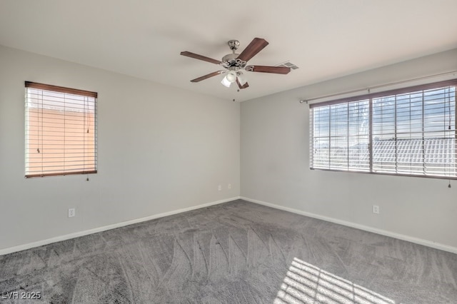 carpeted empty room with ceiling fan