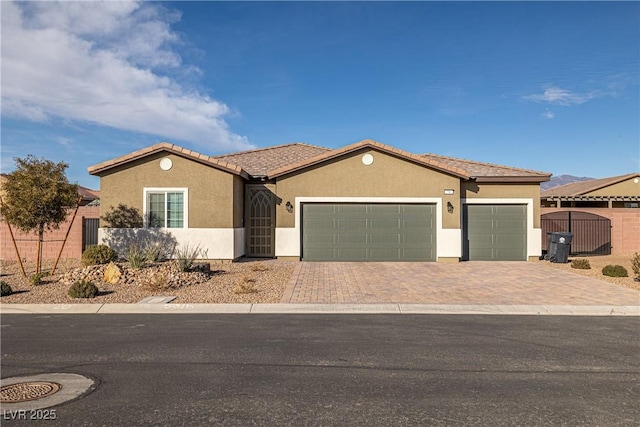 view of front of property with a garage