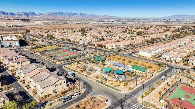 aerial view featuring a mountain view and a residential view