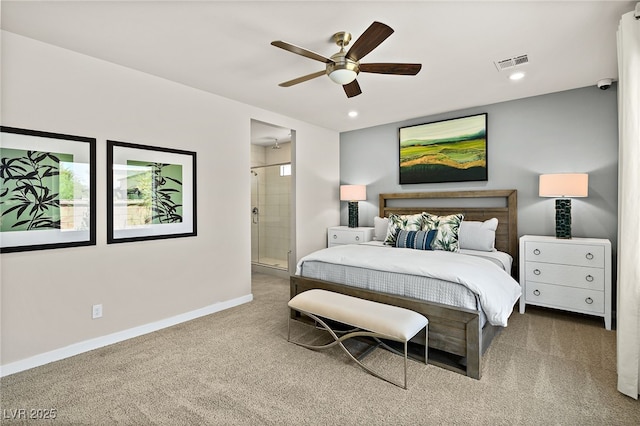 bedroom with connected bathroom, carpet floors, and ceiling fan