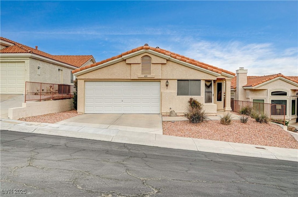 view of front of property featuring a garage