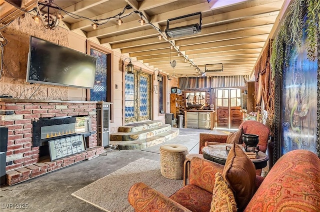 919 Havre Ave, Henderson, NV 89015 - living room with concrete flooring and a fireplace