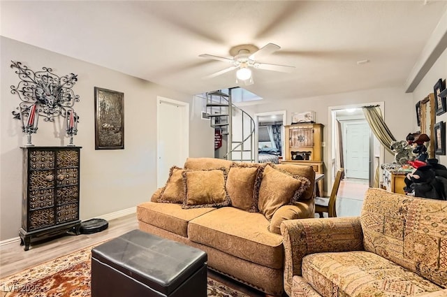 919 Havre Ave, Henderson, NV 89015 - living room featuring a ceiling fan, wood finished floors, and baseboards