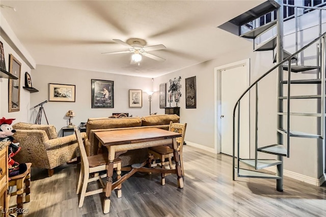 919 Havre Ave, Henderson, NV 89015 - dining space with wood finished floors, baseboards, stairway, and a ceiling fan