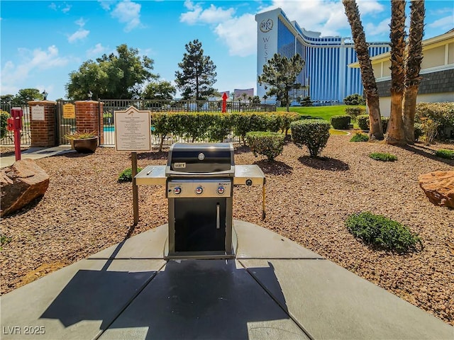 view of patio featuring a grill