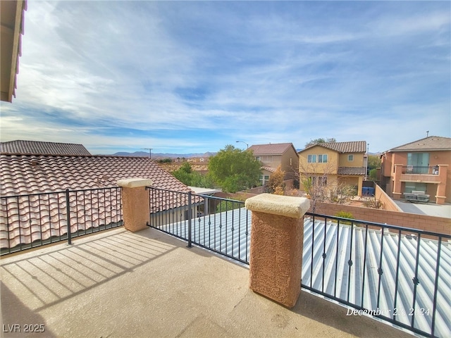 view of patio with a balcony