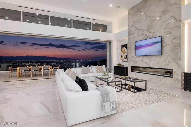 living room featuring a fireplace