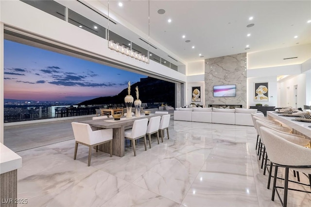 dining room with a large fireplace