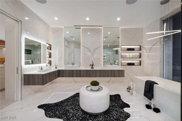 bathroom with a bath and vanity