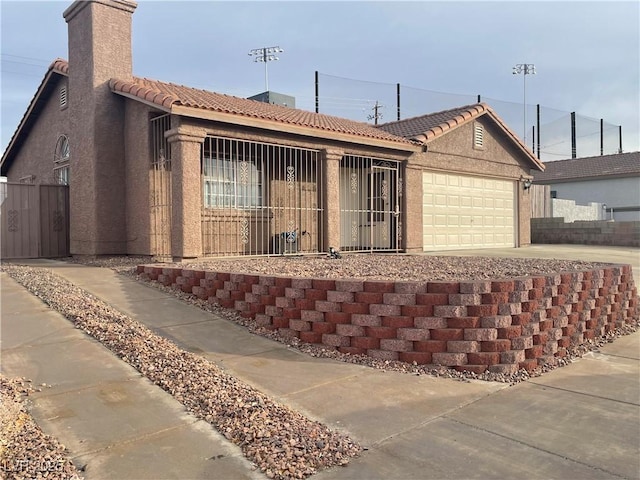 ranch-style home with a garage