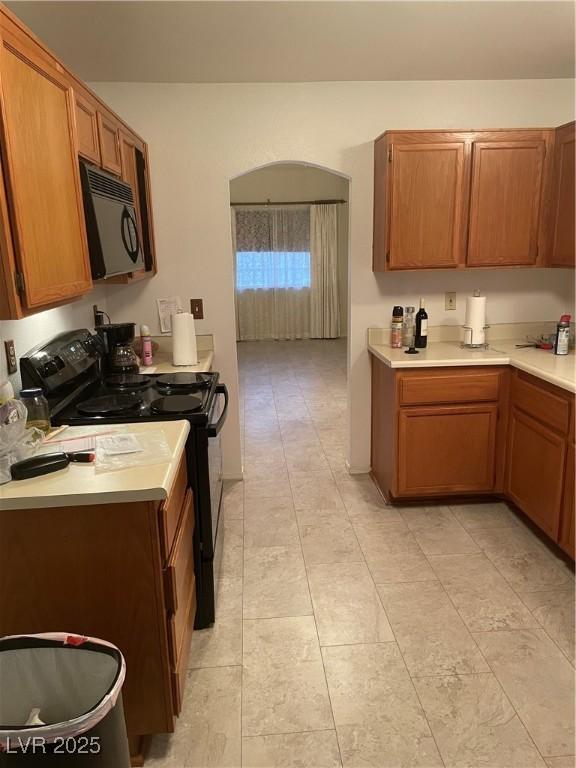 kitchen featuring black appliances