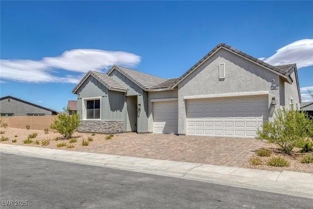 single story home with a garage