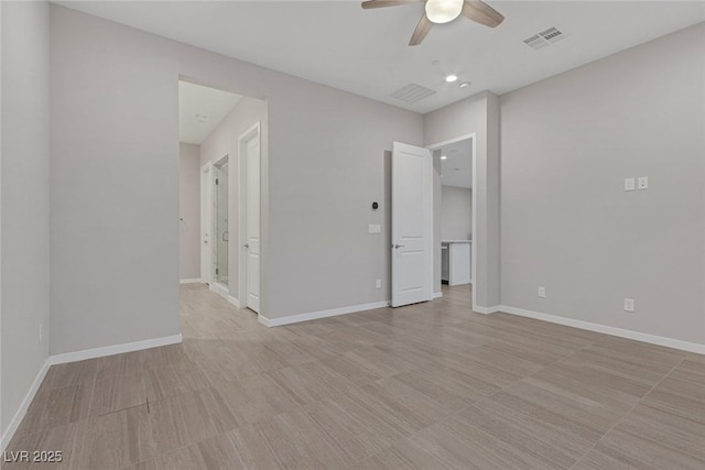 spare room featuring ceiling fan