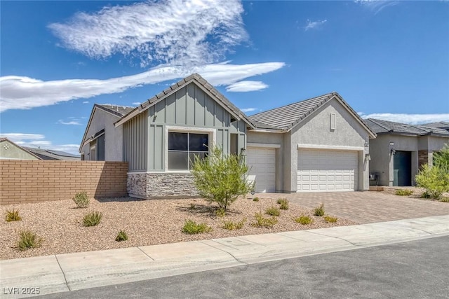 view of front of property with a garage