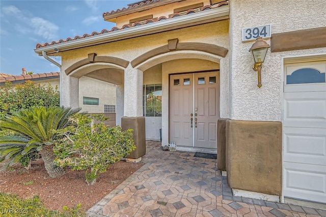 entrance to property with a garage