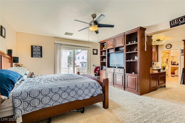 carpeted bedroom with access to outside and ceiling fan