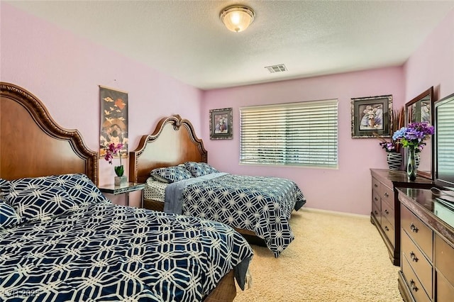 bedroom featuring a textured ceiling