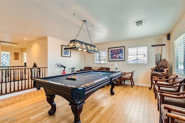 playroom with wood-type flooring and billiards