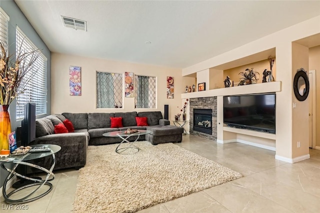 living room featuring a fireplace