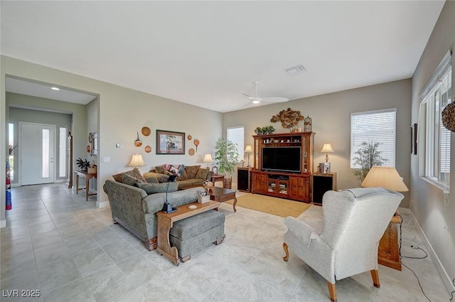 living room with ceiling fan