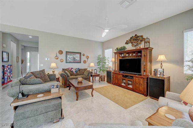 living room with ceiling fan