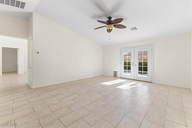 empty room with french doors and ceiling fan