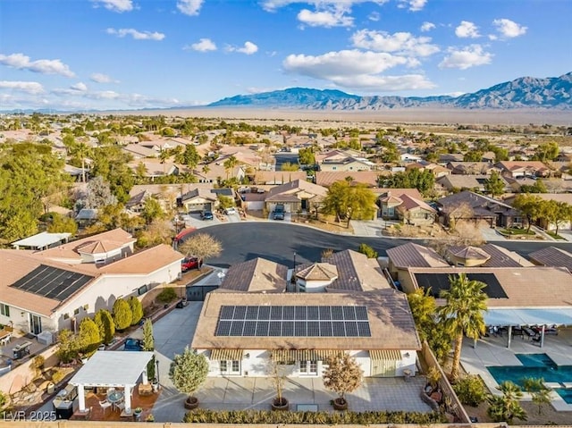 bird's eye view with a mountain view