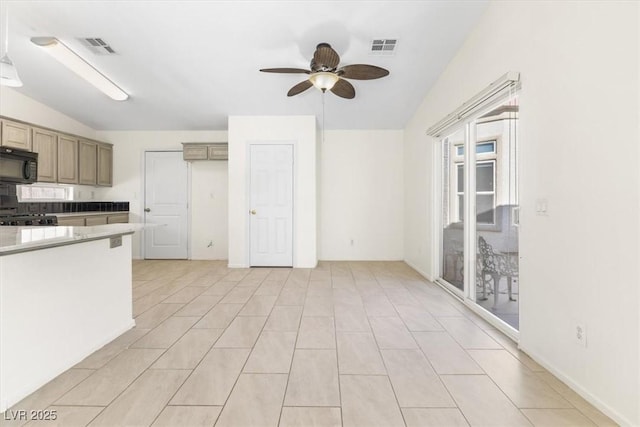 kitchen featuring ceiling fan and light tile patterned floors