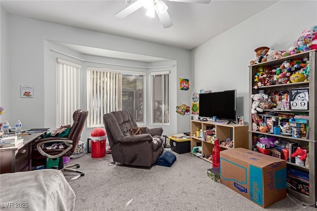 playroom featuring carpet flooring and ceiling fan