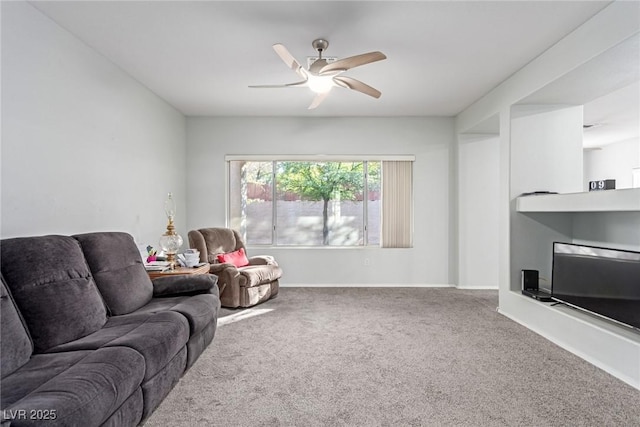 living room with carpet flooring and ceiling fan