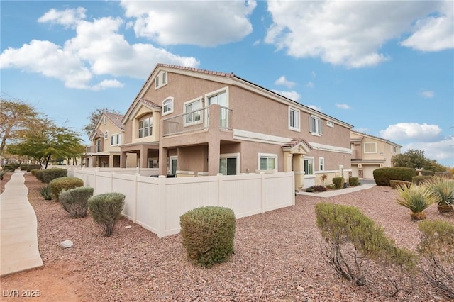 view of side of property featuring a garage